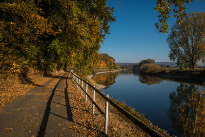 Scenic view of lake against sky during autumn