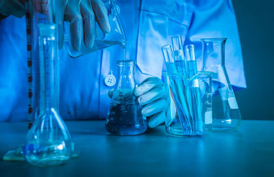 Close-up of blue glass on table