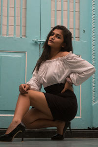 Young woman sitting on seat