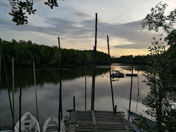 View of calm lake against cloudy sky