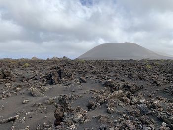 Scenic view of volcanic landscape against sky
