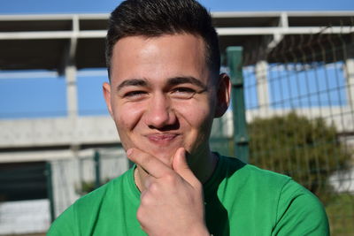 Close-up portrait of a smiling young man