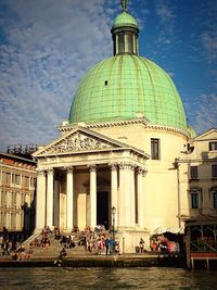 Tourists in front of historic building