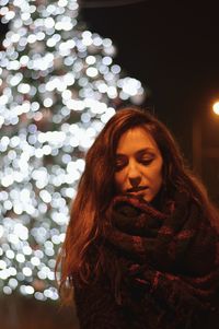 Close-up of young woman looking down