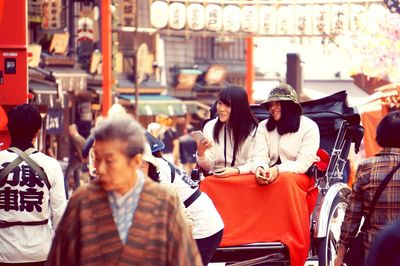 People on street in city