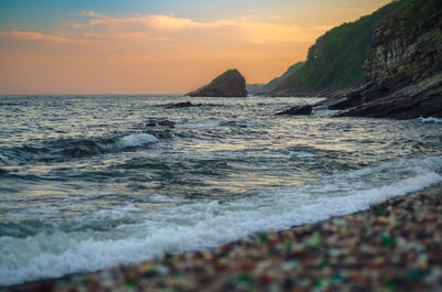 Scenic view of sea against sky during sunset