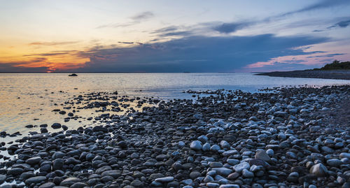 Scenic view of sea against sky during sunset