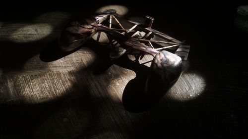 High angle view of shoes on wooden table