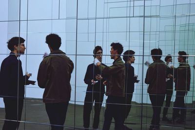 Group of people on escalator in city