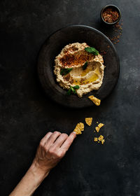 High angle view of man holding bread