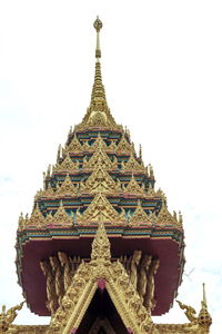 Low angle view of temple against building