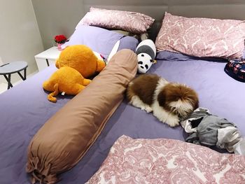 High angle view of stuffed toy on bed at home