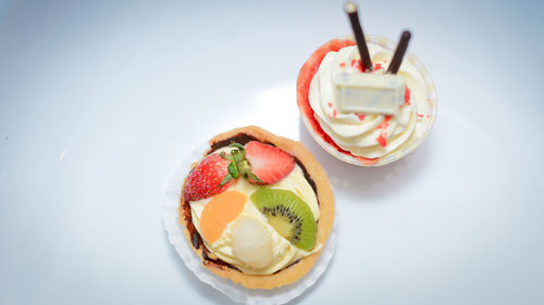 High angle view of fruits in plate on table