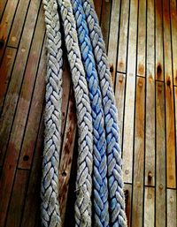 High angle view of ropes on boat deck