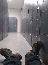 Low section of man relaxing on floor