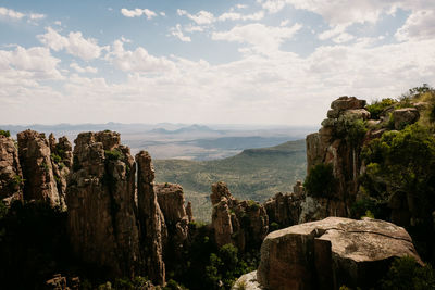 Panoramic view of rocky mountains against sky