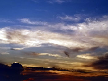 Low angle view of dramatic sky during sunset