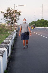 Walking exercise by the hiway 