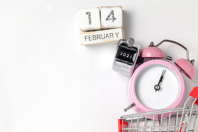 Directly above shot of clock on table