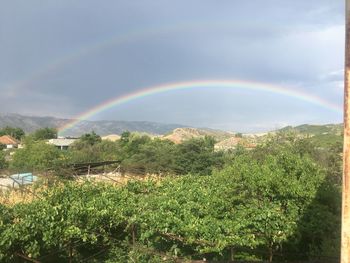 Scenic view of rainbow against sky