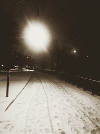 Illuminated street lights at night