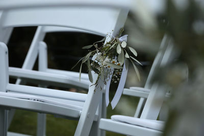 Wedding pictures background, white chairs with floral decoration