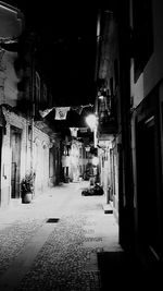 Illuminated street at night