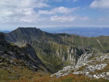 Scenic view of rocky mountains against sky