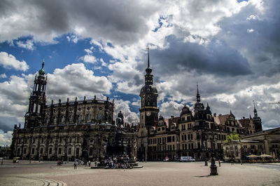 Dresden castle in city against cloudy sky