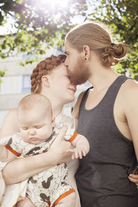 Young parents with baby