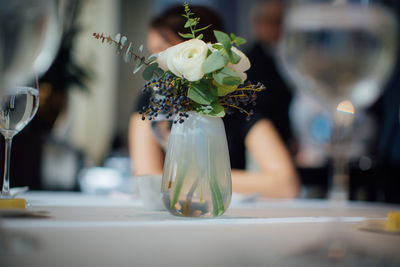 Close-up of flower vase on table