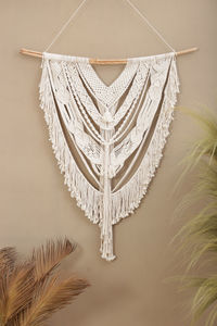Close-up of decoration hanging against wall