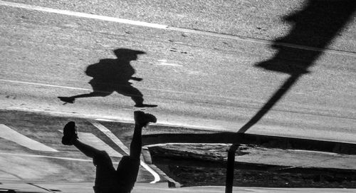 Shadow of woman on wall