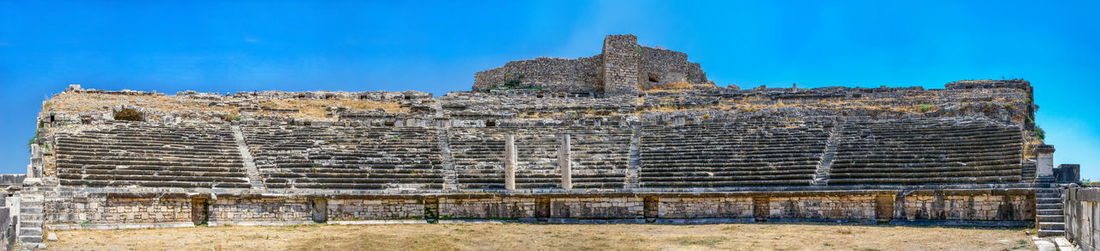 Old ruins against blue sky