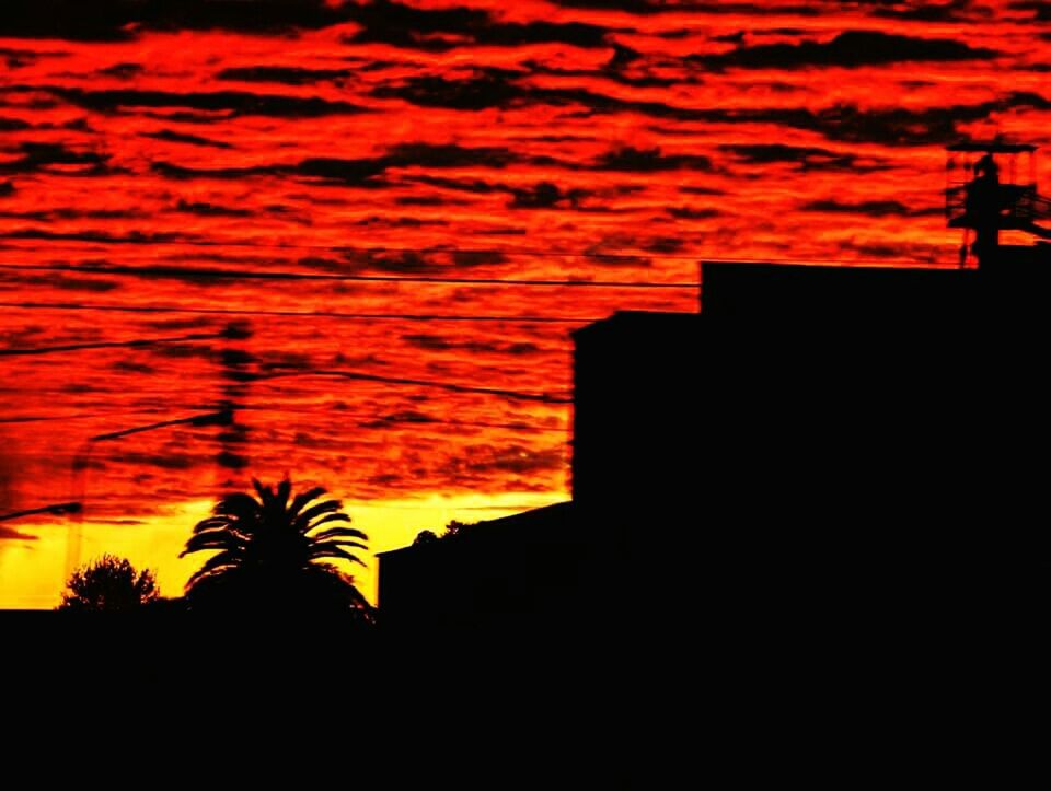 sunset, silhouette, orange color, architecture, built structure, building exterior, sky, house, dramatic sky, beauty in nature, cloud - sky, cloud, nature, scenics, tranquility, dusk, outdoors, no people, red, moody sky