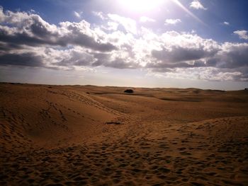 Scenic view of desert against sky