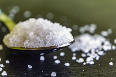 Close-up of spoon with salt