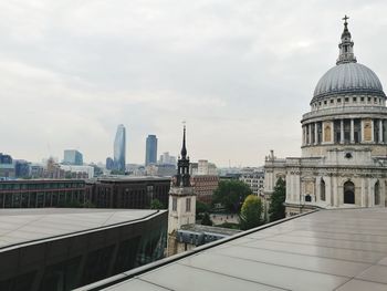 View of buildings in city against sky