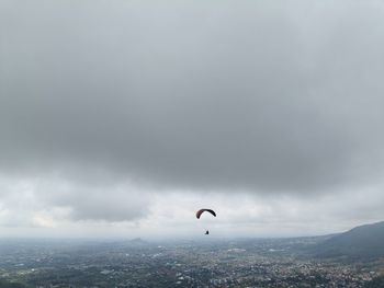 Low angle view of airplane flying in sky