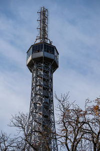 Low angle view of communications tower against sky in prague 