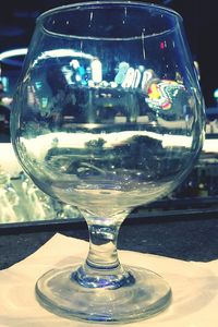 Close-up of beer glasses on table