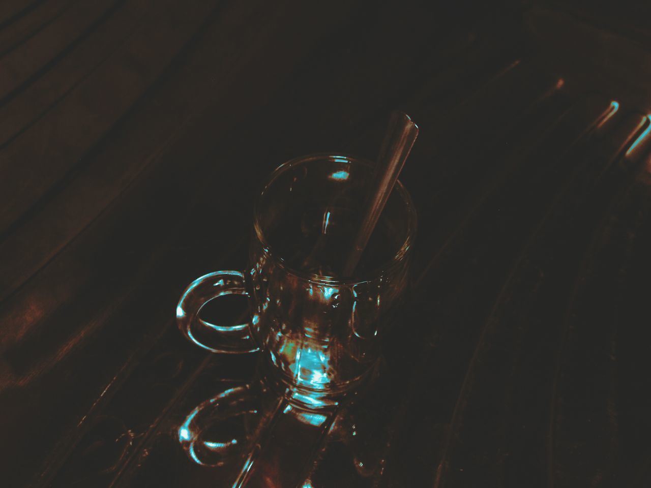 HIGH ANGLE VIEW OF WINE GLASS ON TABLE AT NIGHT