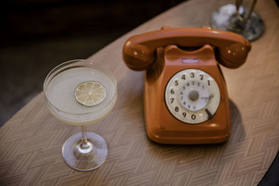 High angle view of telephone on table