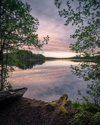 Scenic view of lake against sky during sunset