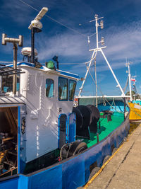 Cutters berthed at the harbour