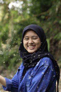 Portrait of a smiling young woman
