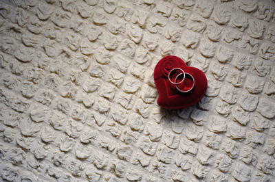 Close-up of wedding rings on box