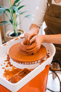 Midsection of woman working