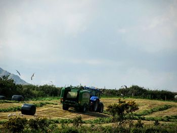 Tractor on grassy field