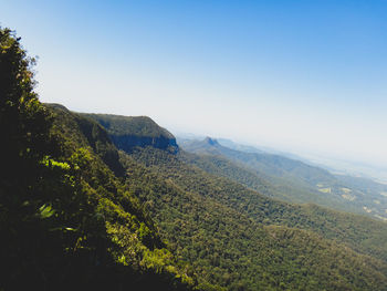 Scenic view of landscape against clear blue sky